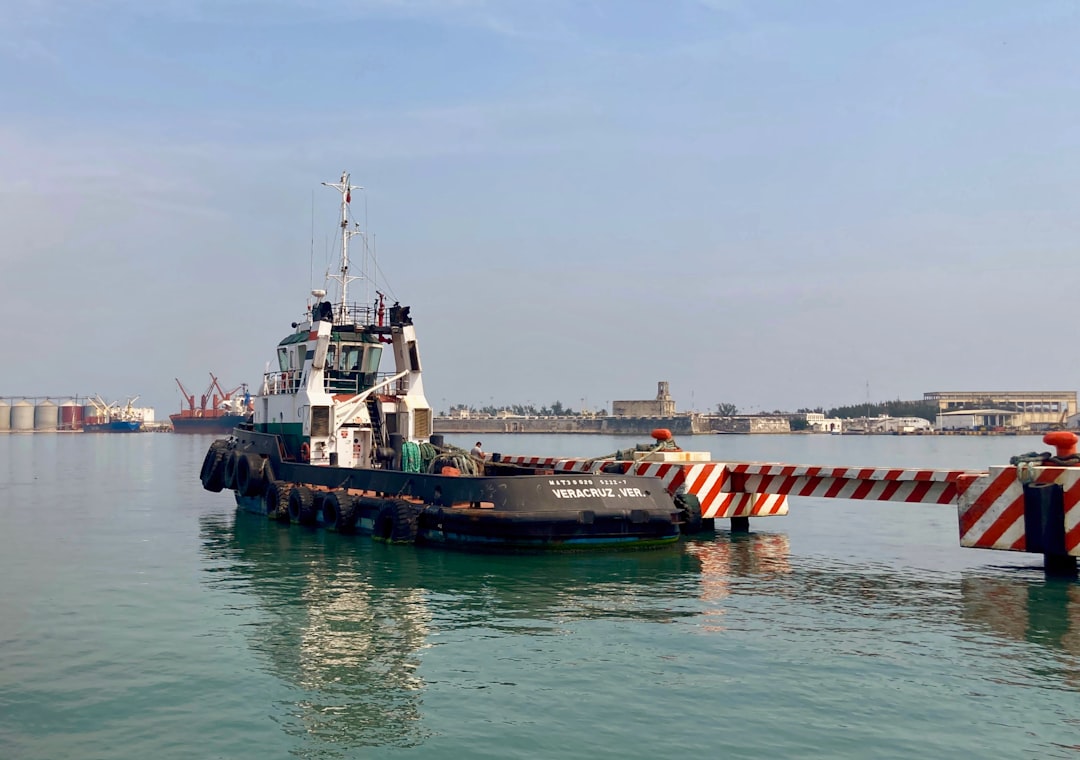 Tugboat moored at a commercial port, representing Gulf tug and workboat operations with Yanmar auxiliary engines