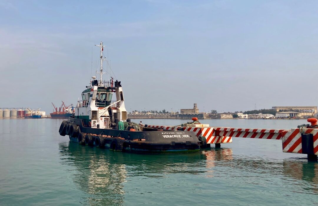 Commercial tugboat in port — Caterpillar marine engine spares for Gulf commercial fleets. Photo by Unsplash.